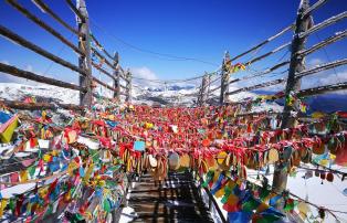 China shutterstock China_ShangriLa_ShikaSnowMountain_Prayerflags_shutterstock_19