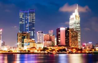 Asien Vietnam Asian Trails Ho Chi Minh City - Skyline from the water_1920