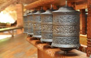 China shutterstock China_Tibet_Lhasa_PrayerWheels_shutterstock_1920